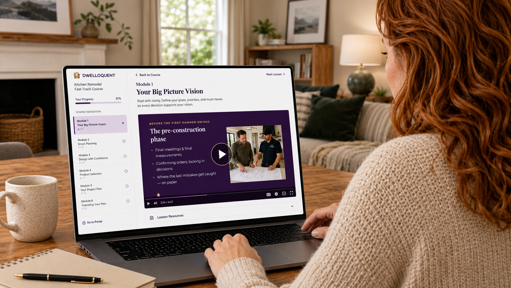 Homeowner following along with the Kitchen Remodel Fast-Track Course on her laptop